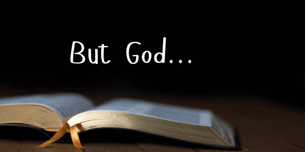An open book with a blue cover and a golden spine, displaying the text 'But God...' in a playful font against a dark background.